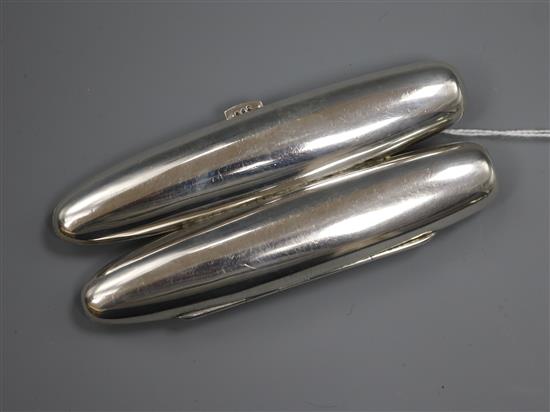 An Austro-Hungarian 900 standard white metal twin compartment cigar case, 11.8cm.